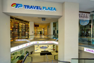 トラベルプラザ（入口はTギャラリア by DFSに面した階段）